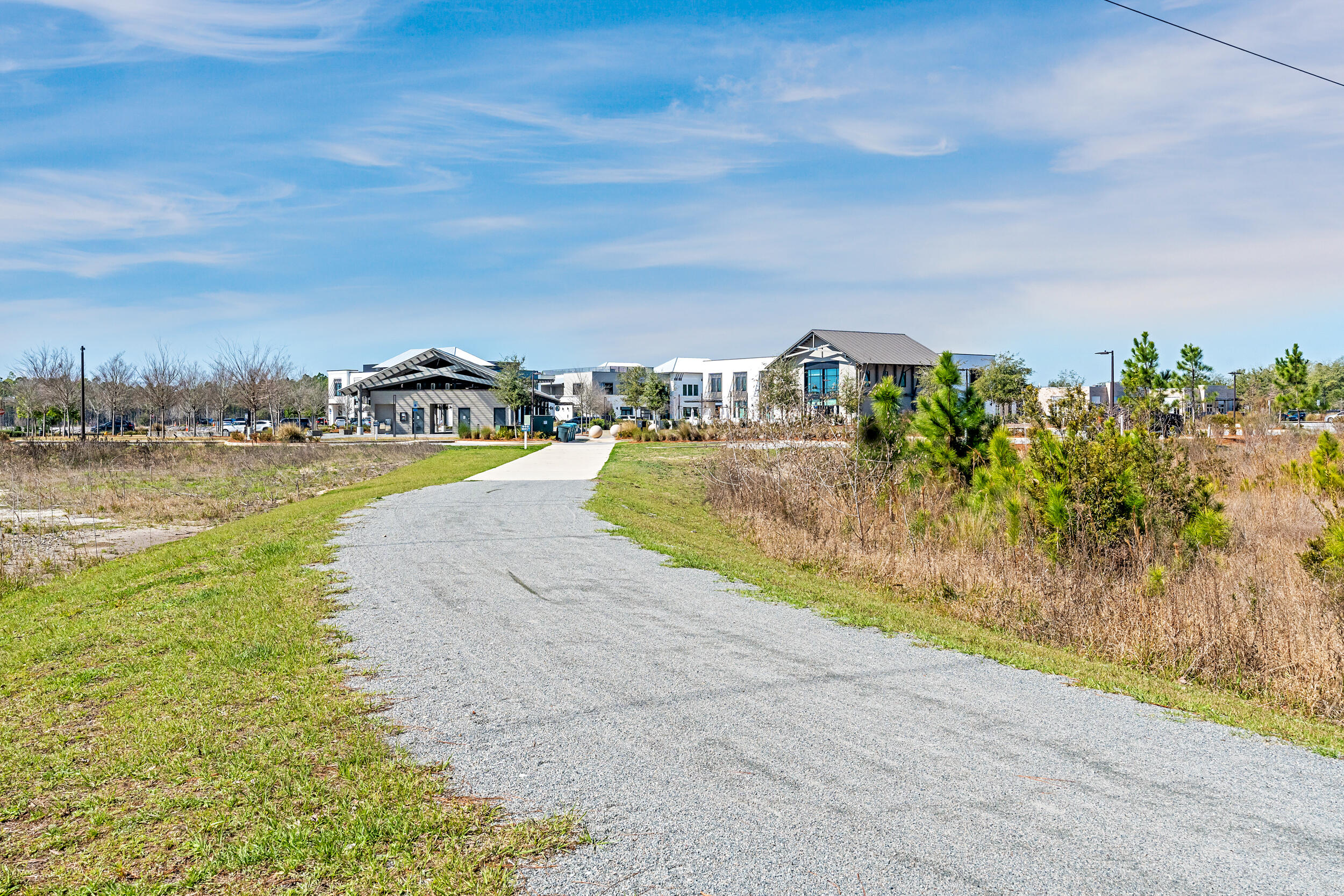 35 Golden Bell Ct Inlet Beach, Unit 35A Inlet Beach, FL 32461 - Photo 32 of 47 a view of a lake with a big yard
