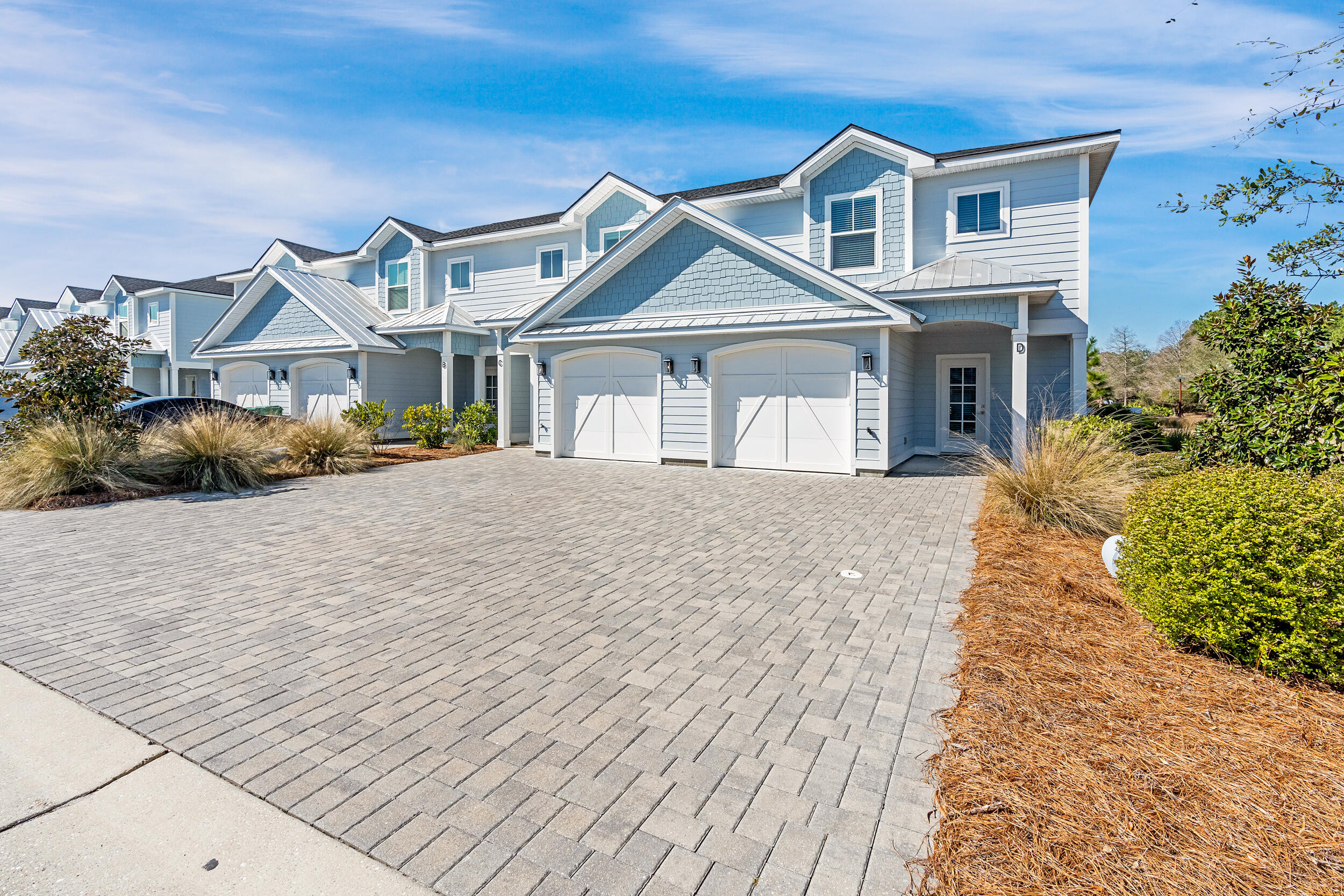 35 Golden Bell Ct Inlet Beach, Unit 35A Inlet Beach, FL 32461 - Photo 7 of 47 a front view of a house with a yard