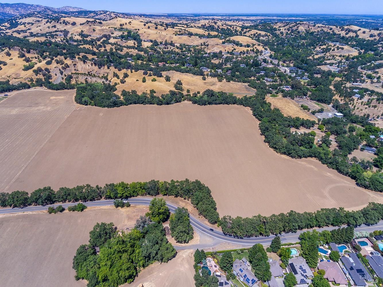 0 Vaca Valley Road Vacaville, CA 95688 - Photo 11 of 28 an aerial view of lake and residential houses with outdoor space and trees