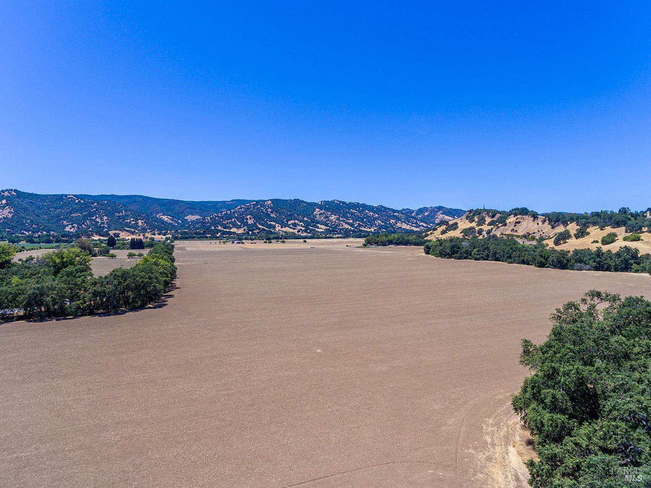 0 Vaca Valley Road Vacaville, CA 95688 - Photo 13 of 28 an aerial view of a city and lake view