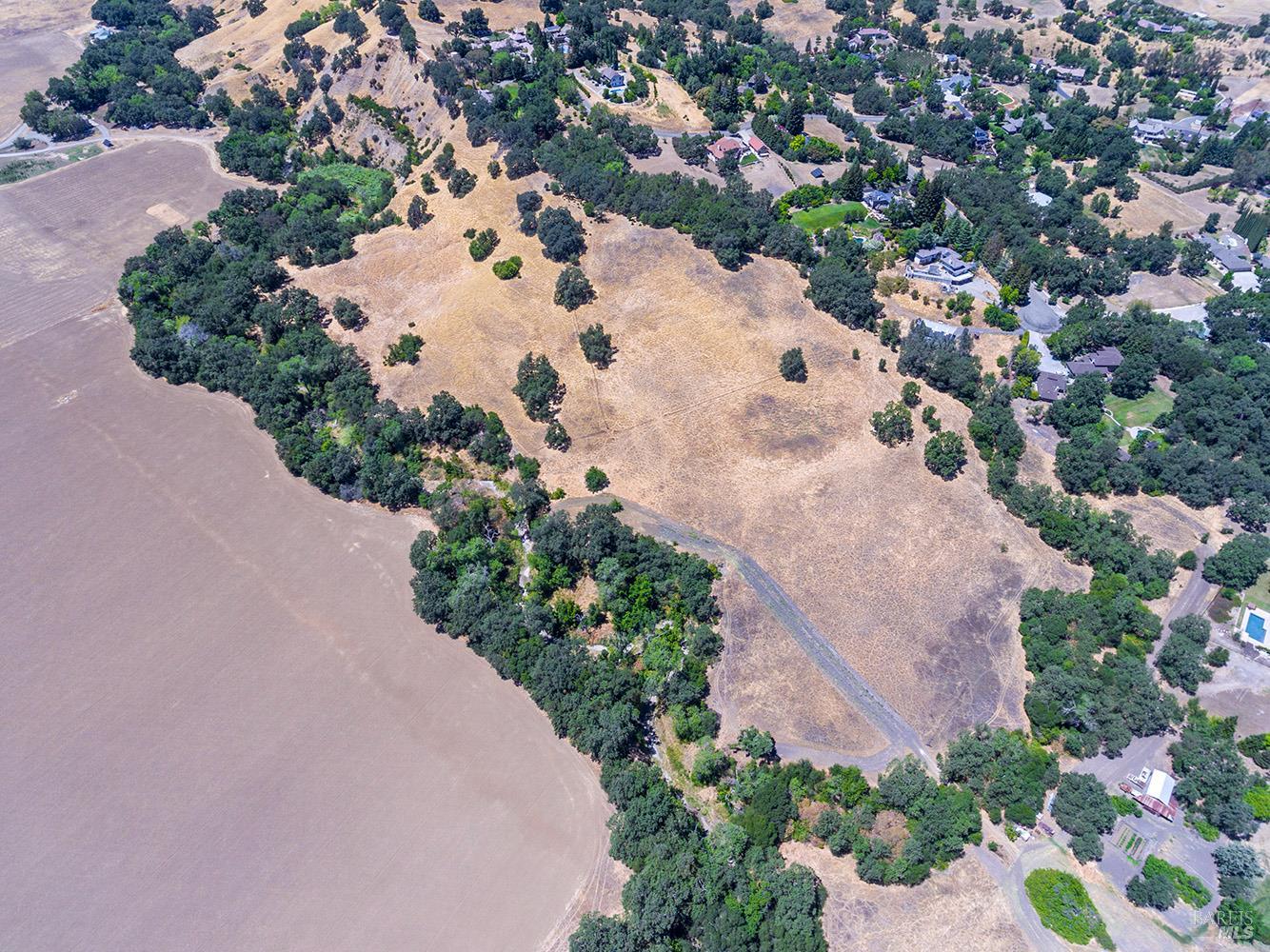 0 Vaca Valley Road Vacaville, CA 95688 - Photo 17 of 28 an aerial view of a house with a yard and parking space