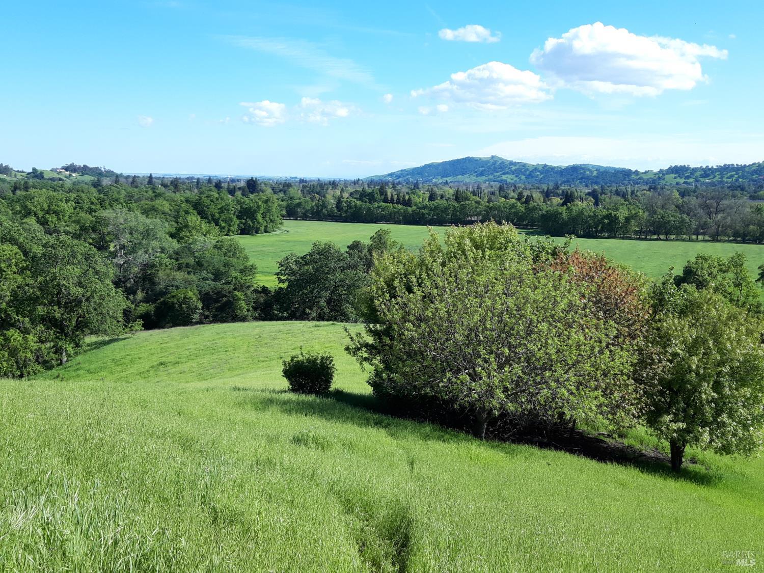 0 Vaca Valley Road Vacaville, CA 95688 - Photo 4 of 28 a view of a lake with a yard