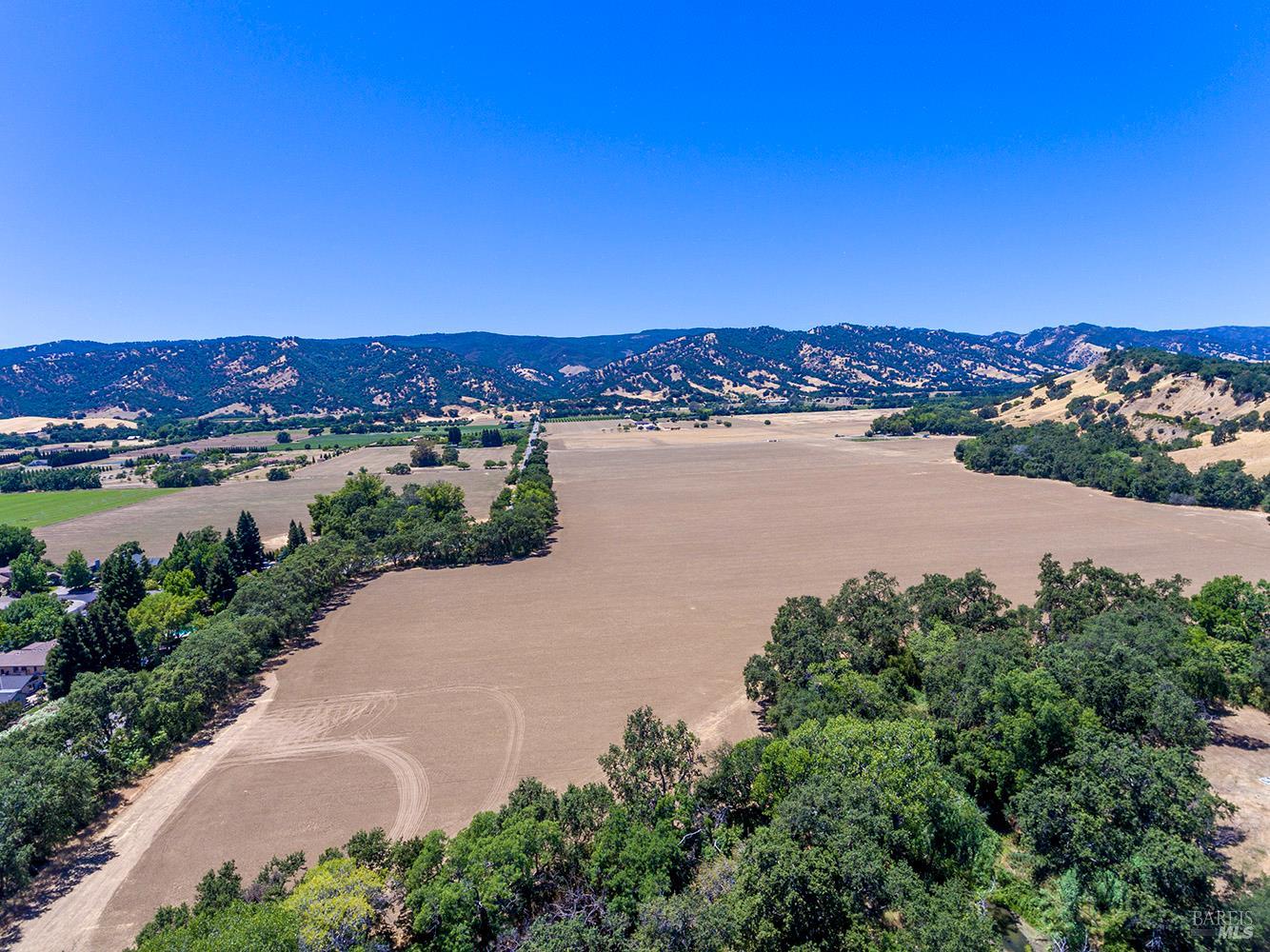 0 Vaca Valley Road Vacaville, CA 95688 - Photo 5 of 28 an aerial view of ocean and residential houses with outdoor space and trees