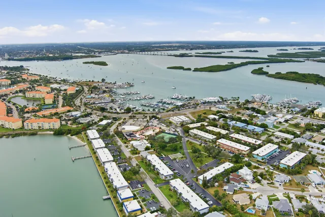 an aerial view of a multi story parking space
