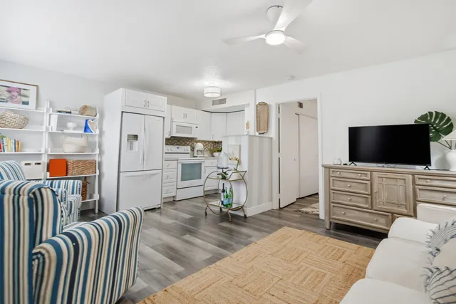 a kitchen with refrigerator and washer