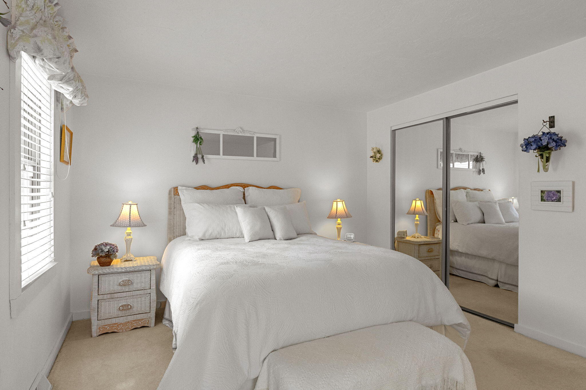 49 Shellback Way, Unit G Mashpee, MA 02649 - Photo 20 of 48 a bedroom with a bed and a couch