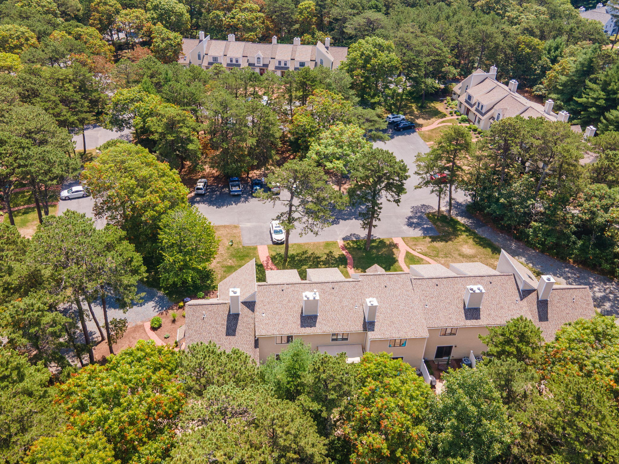 49 Shellback Way, Unit G Mashpee, MA 02649 - Photo 43 of 48 an aerial view of house with yard and swimming pool