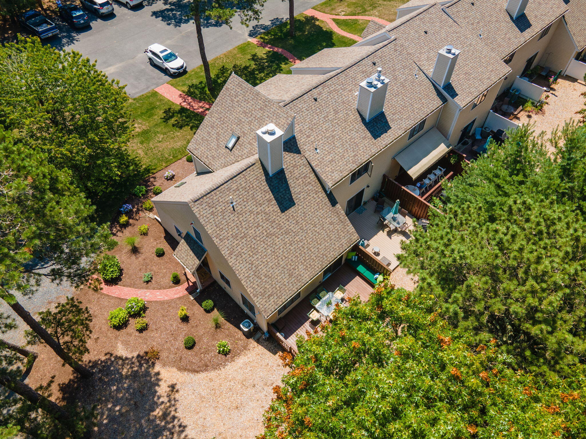 49 Shellback Way, Unit G Mashpee, MA 02649 - Photo 44 of 48 an aerial view of a house with a yard