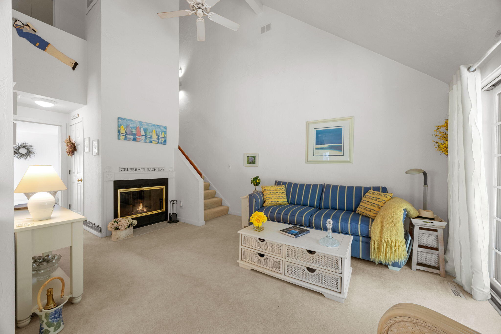 49 Shellback Way, Unit G Mashpee, MA 02649 - Photo 8 of 48 a living room with furniture and a fireplace