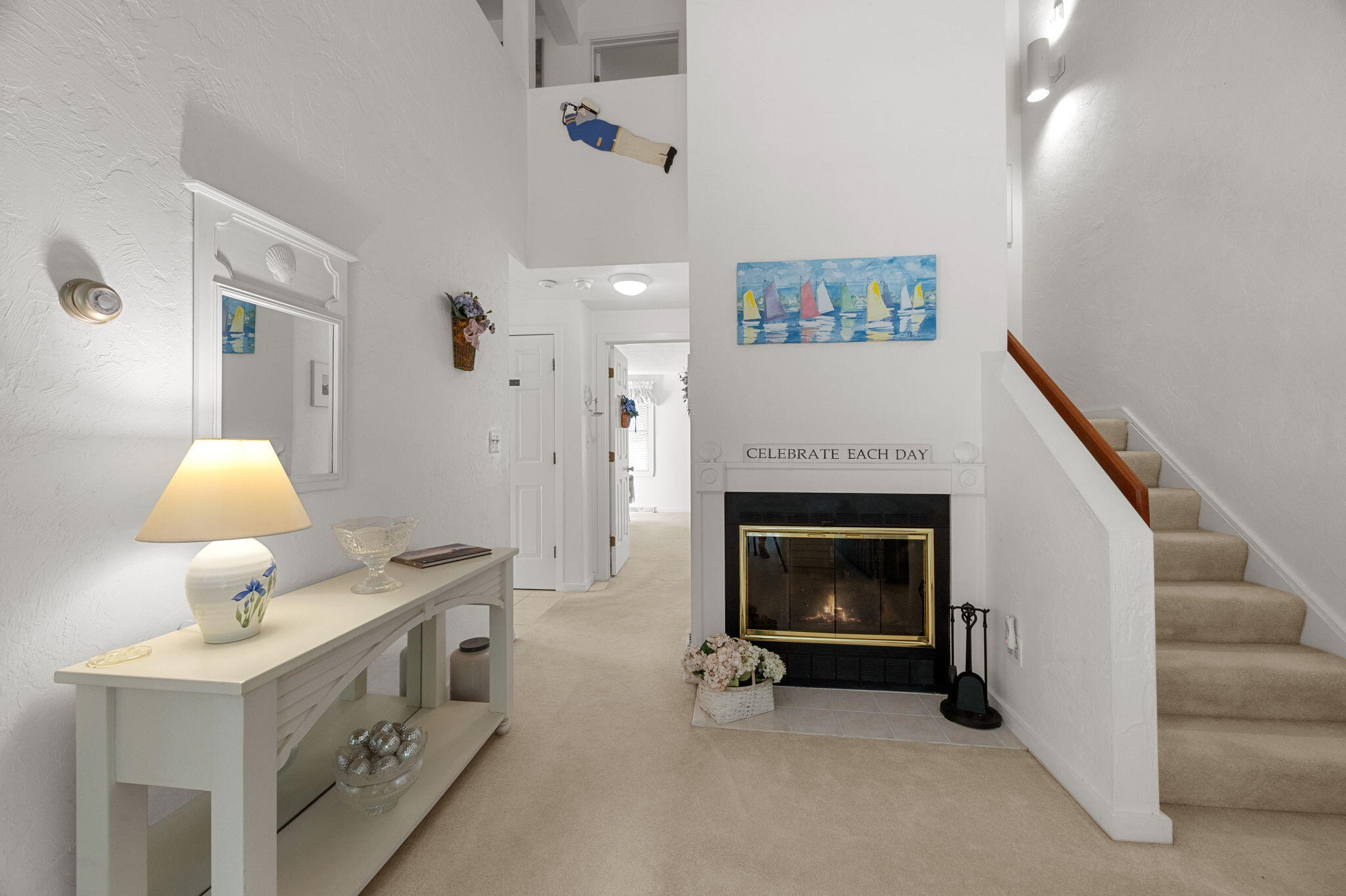 49 Shellback Way, Unit G Mashpee, MA 02649 - Photo 9 of 48 a living room with furniture and a fireplace