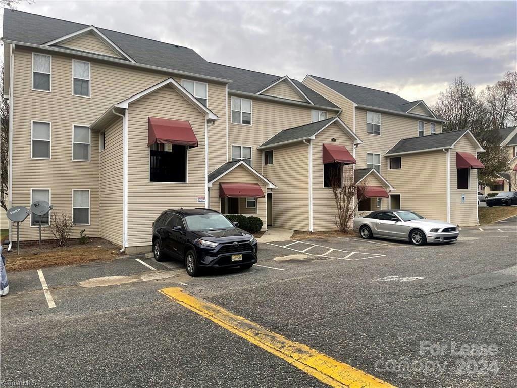 304 Ardale Drive, Unit 1B High Point, NC 27260 - Photo 1 of 1 a car parked in front of a house