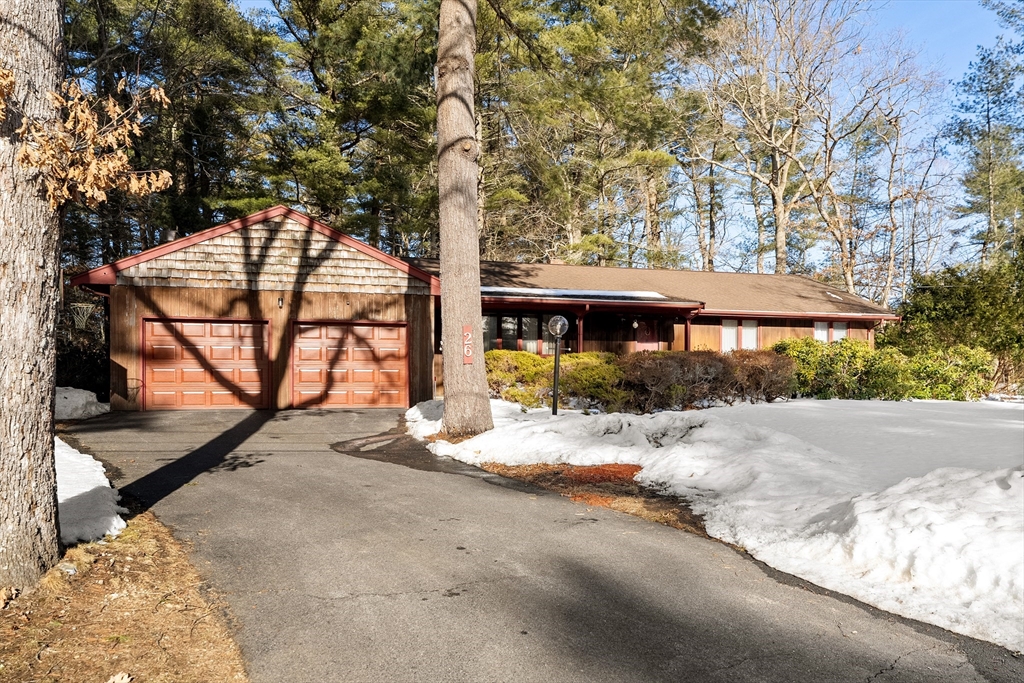 26 Nottingham Drive Raynham, MA 02767 - Photo 1 of 42 a view of a house with backyard porch and sitting area