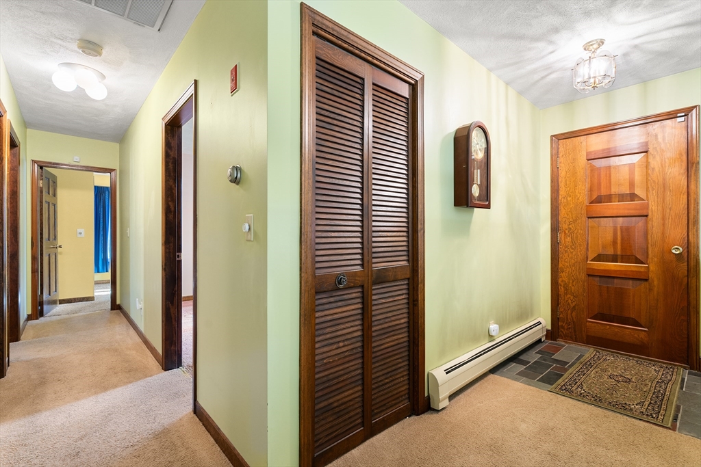 26 Nottingham Drive Raynham, MA 02767 - Photo 20 of 42 a view of a bathroom from the hallway