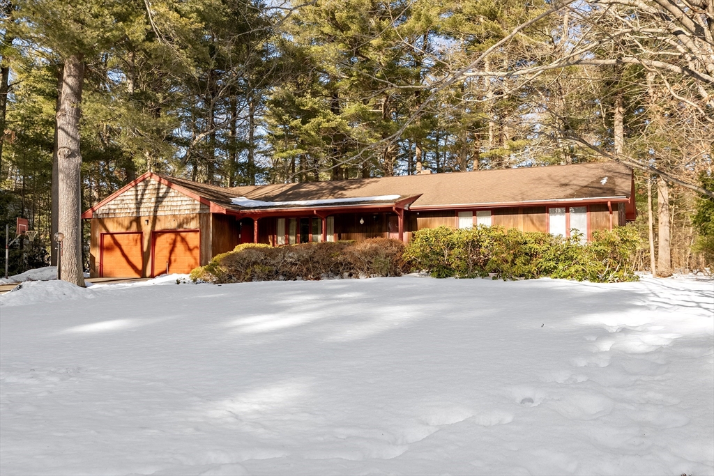 26 Nottingham Drive Raynham, MA 02767 - Photo 2 of 42 front view of a house with a street