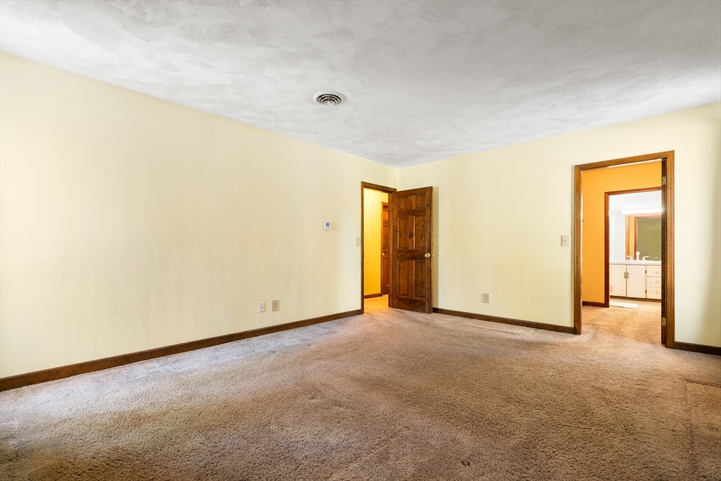 26 Nottingham Drive Raynham, MA 02767 - Photo 23 of 42 a view of an empty room