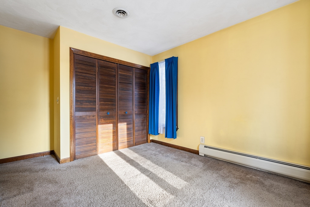 26 Nottingham Drive Raynham, MA 02767 - Photo 28 of 42 a view of an empty room with a window