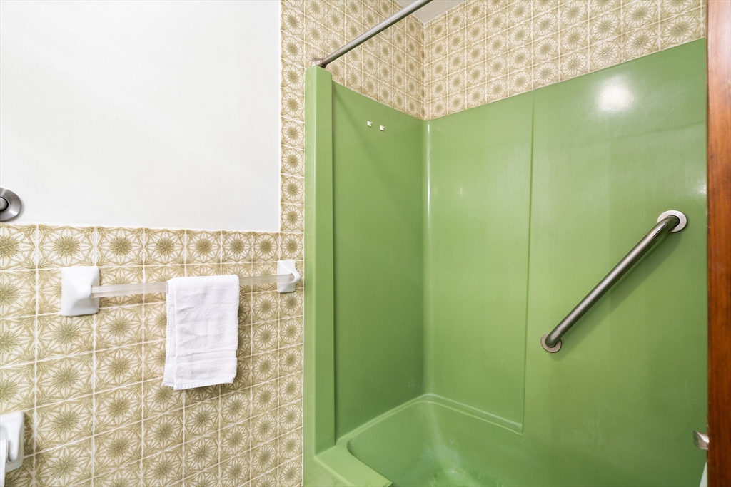 26 Nottingham Drive Raynham, MA 02767 - Photo 32 of 42 a bathroom with a shower