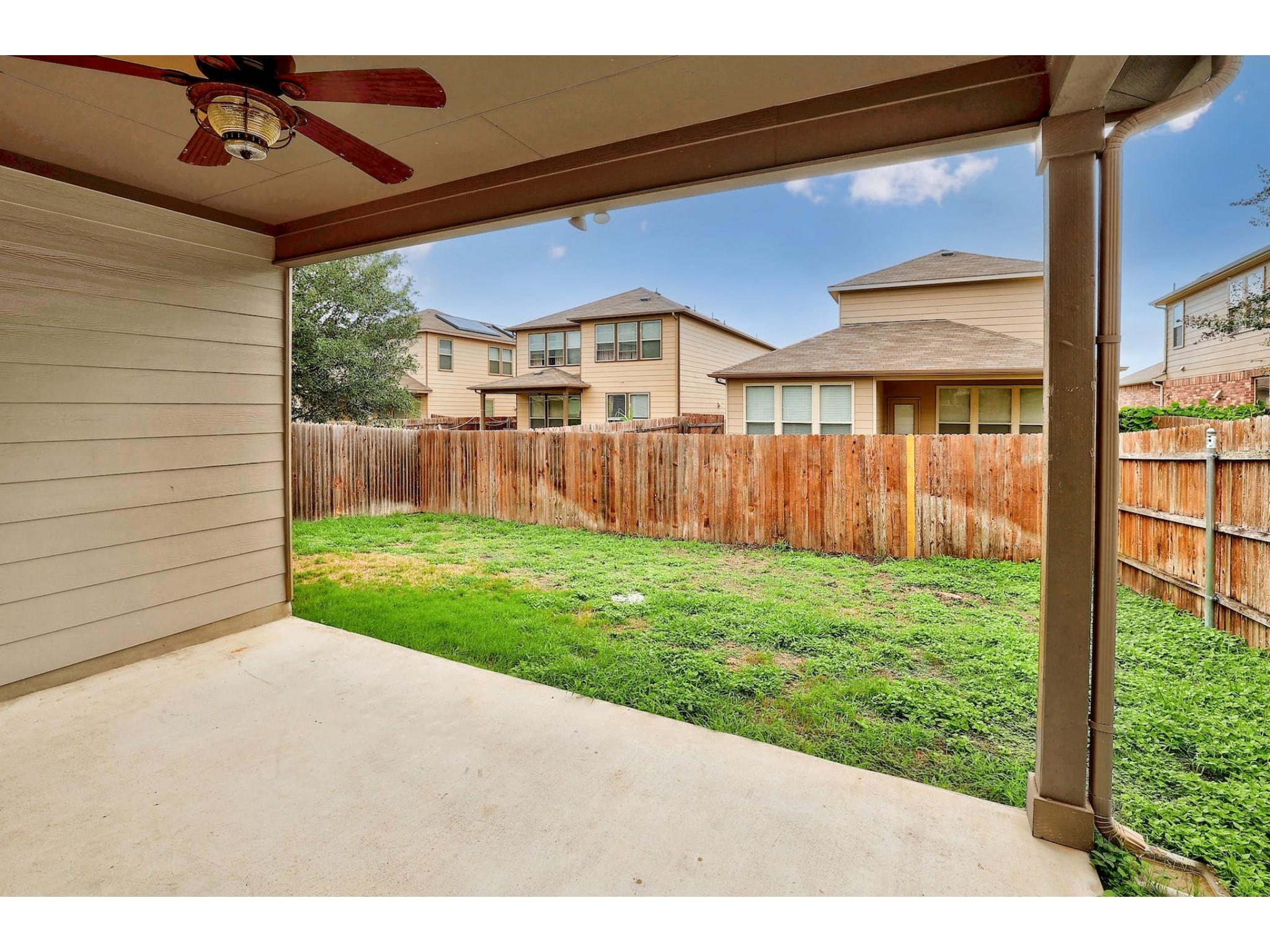 16021 Travesia Way Austin, TX 78728 - Photo 24 of 27 a view of a backyard with plants