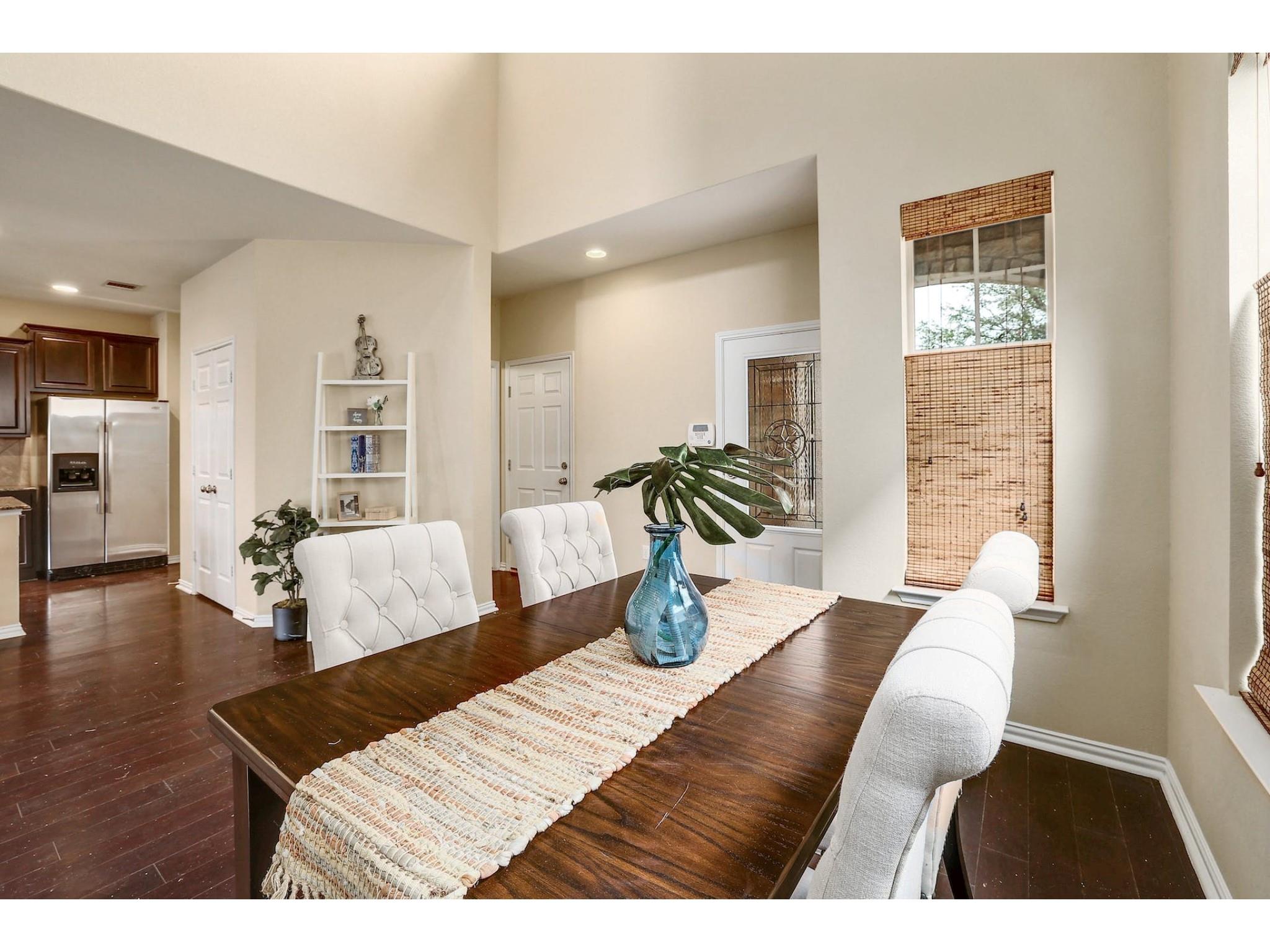16021 Travesia Way Austin, TX 78728 - Photo 4 of 27 a living room with furniture and wooden floor