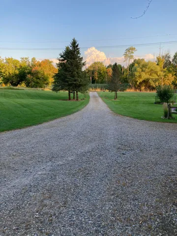 $630,000 | 2725 Cooley Lake Road, Highland, MI 48356