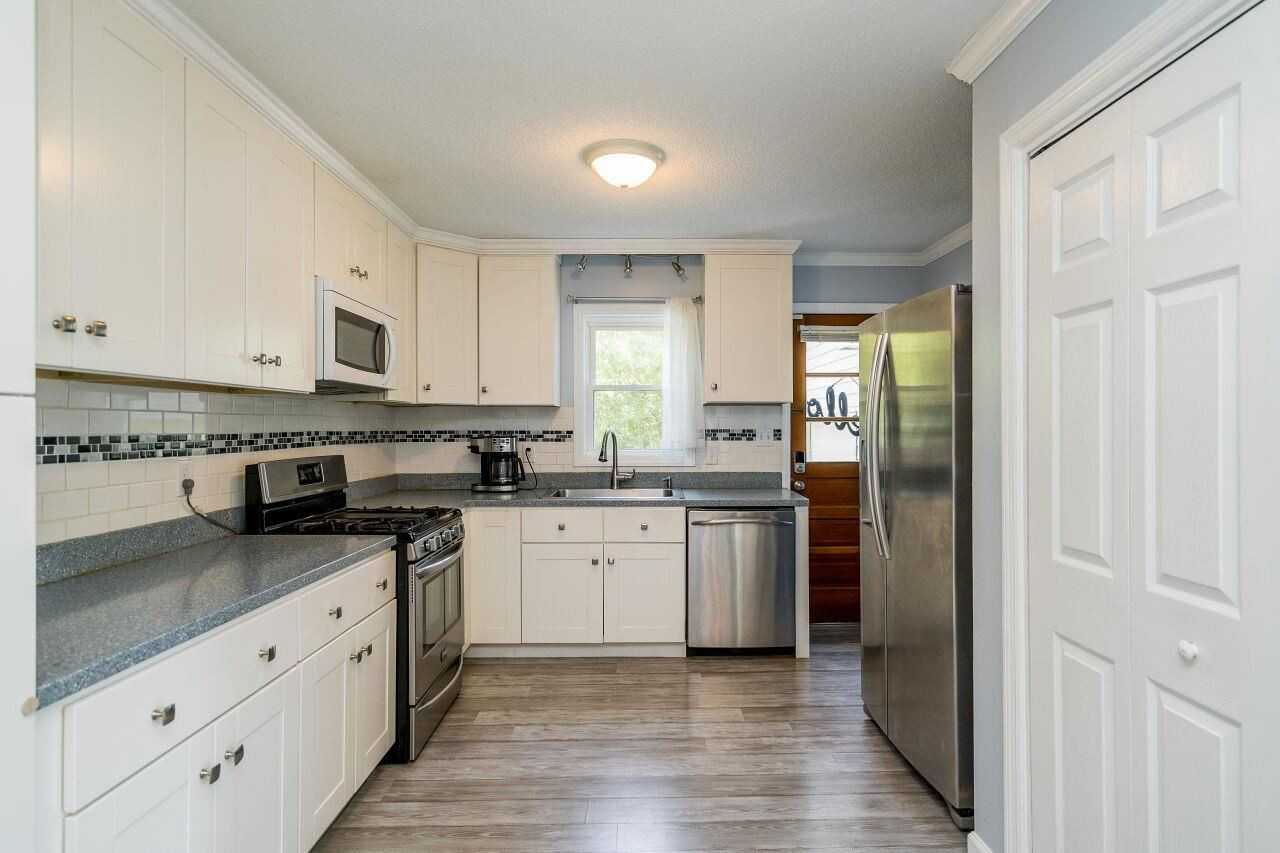 2125 Balboa Road Raleigh, NC 27603 - Photo 11 of 26 The laundry closet is conveniently located in the kitchen. Kitchen