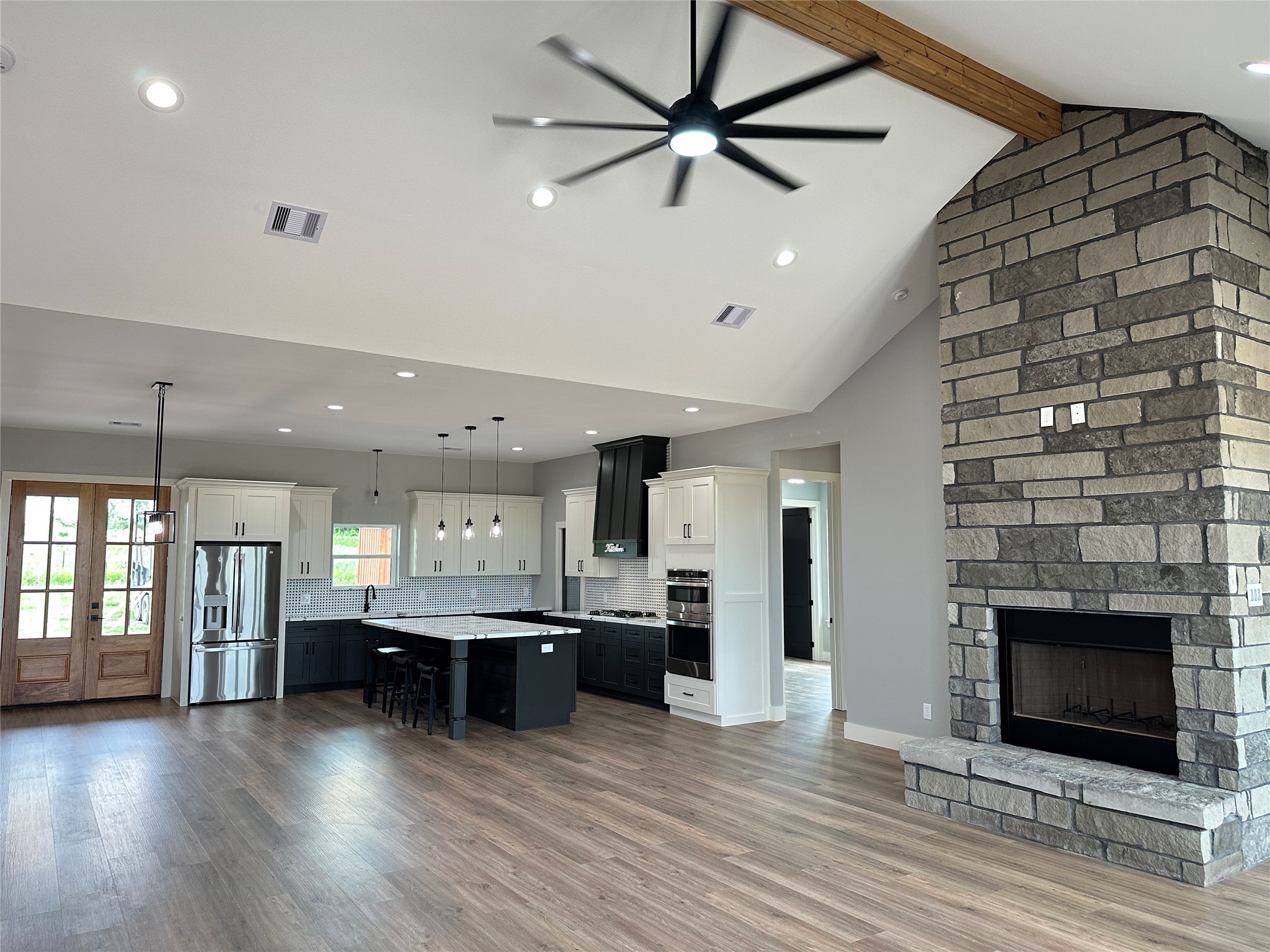 3880 Hranicky Road Schulenburg, TX 78956 - Photo 35 of 35 Upon entry: open floor plan, vaulted ceiling, woodburning fireplace.