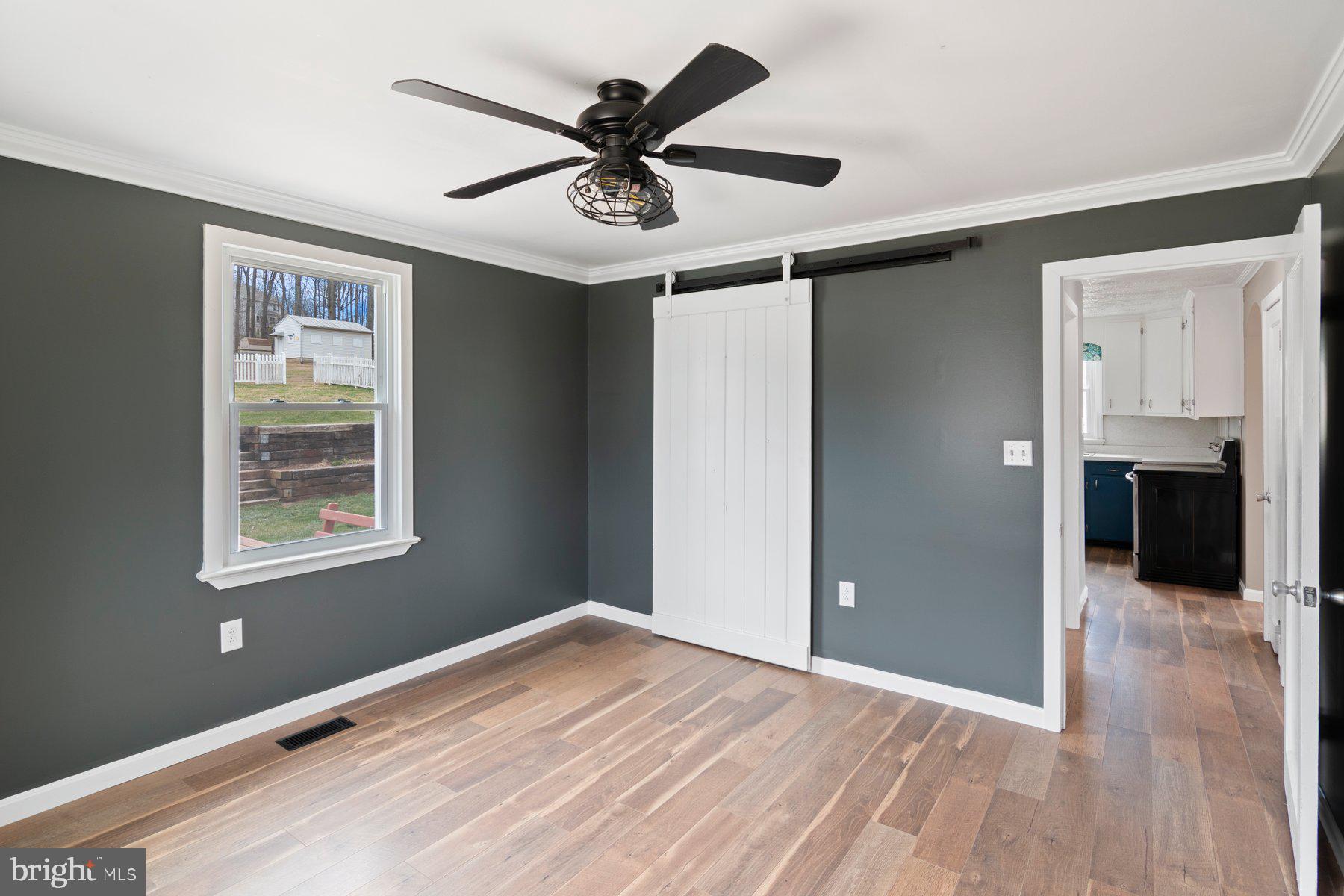 1621 Ridge Road Westminster, MD 21157 - Photo 9 of 34 a view of a livingroom with a ceiling fan and window