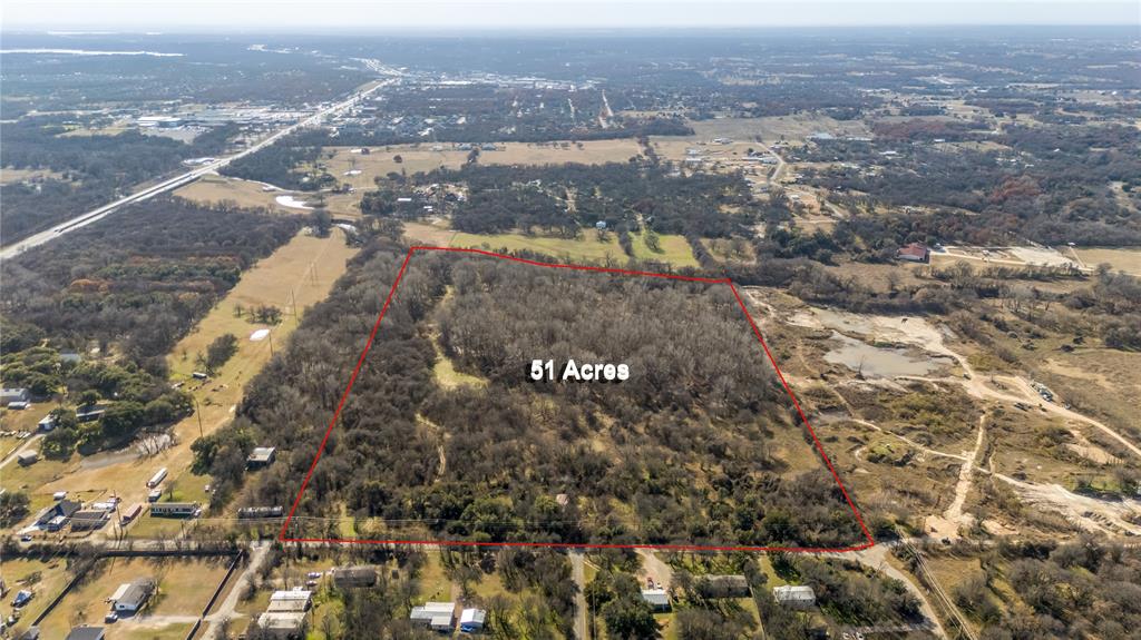 1620 West Timberlake Street, Unit B Azle, TX 76020 - Photo 4 of 12 an aerial view of residential house and lake view