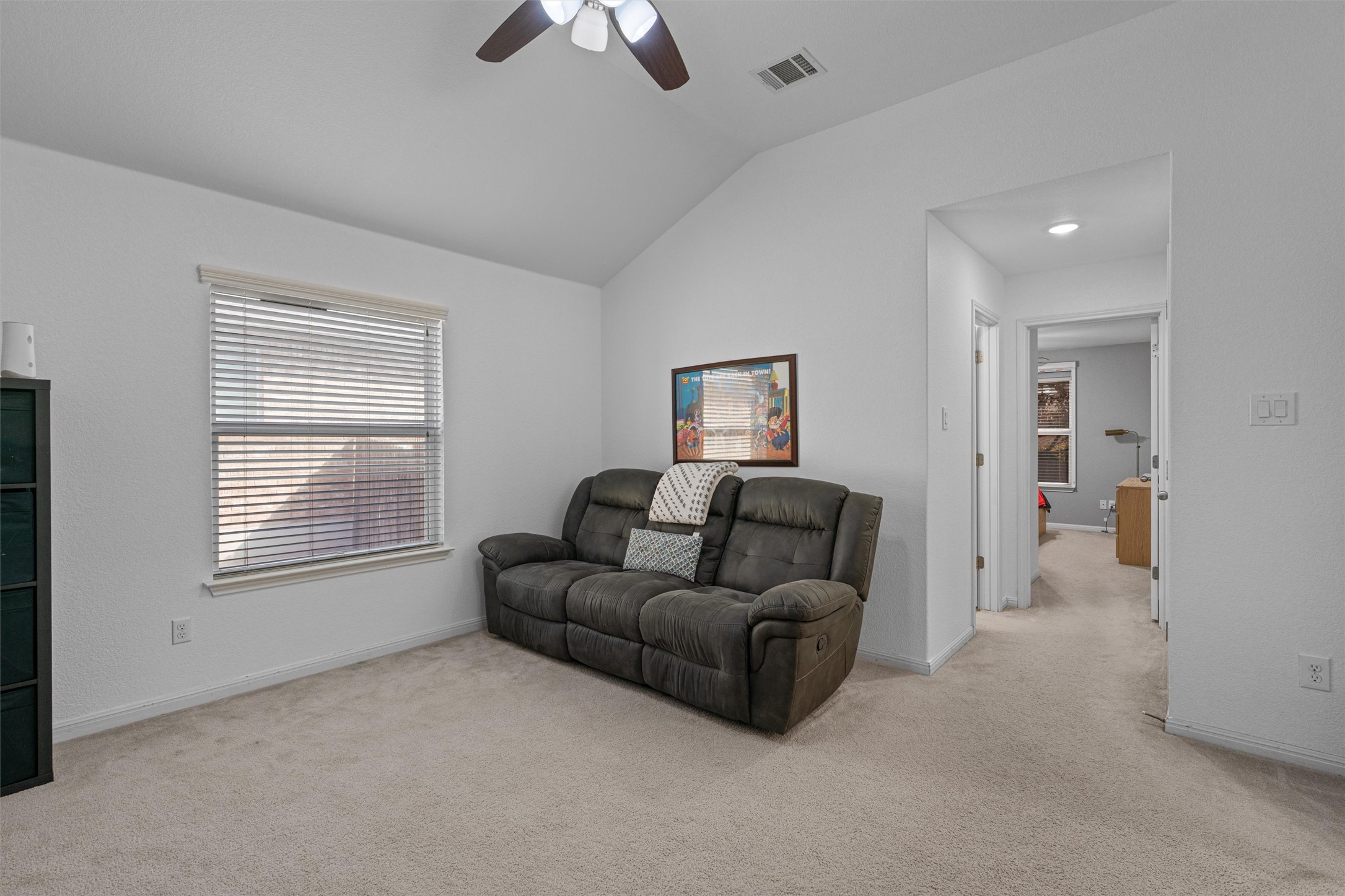 20513 Jackies Ranch Boulevard Pflugerville, TX 78660 - Photo 16 of 35 a living room with furniture and a window
