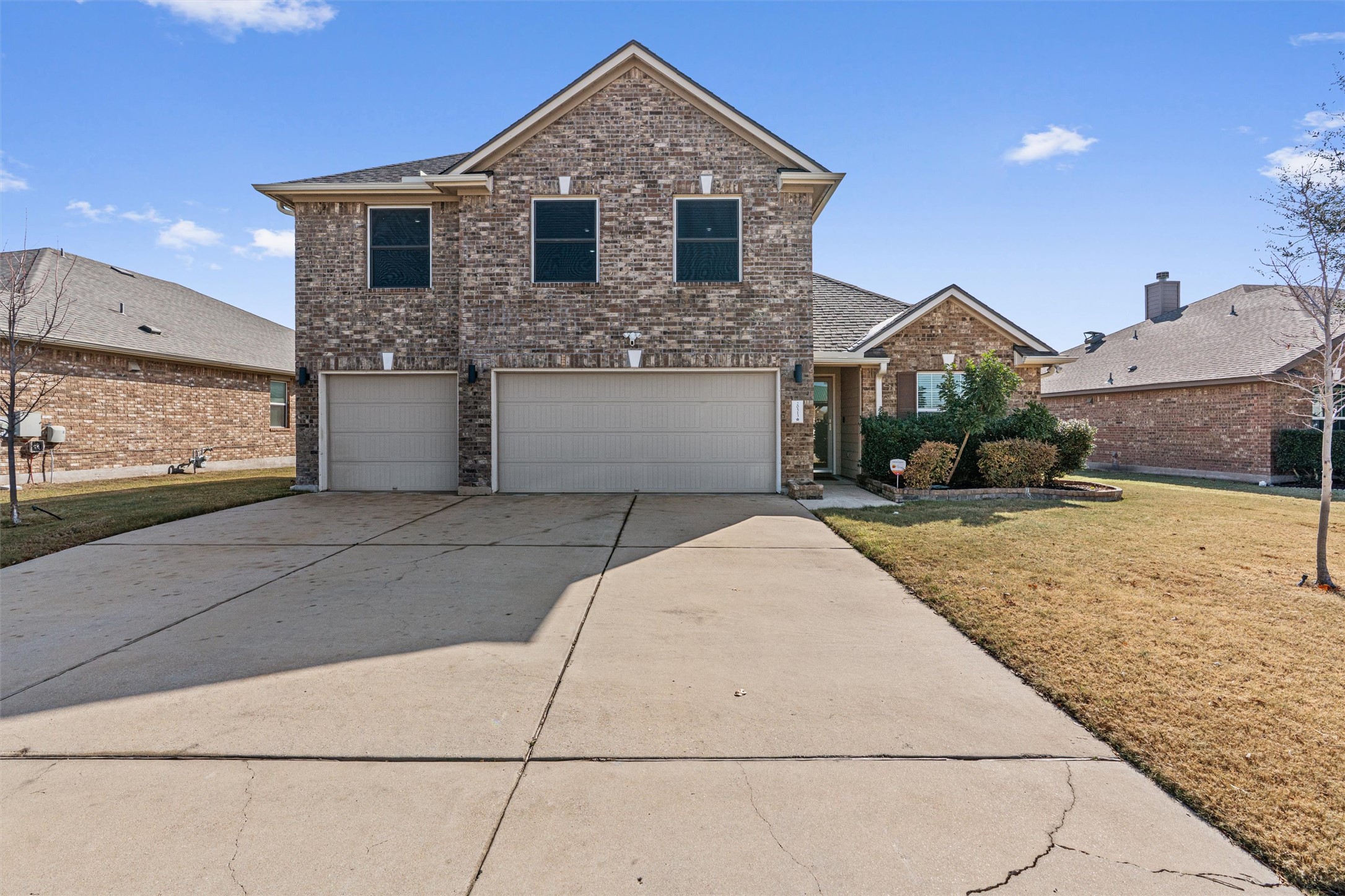 20513 Jackies Ranch Boulevard Pflugerville, TX 78660 - Photo 2 of 35 a front view of a house with a yard