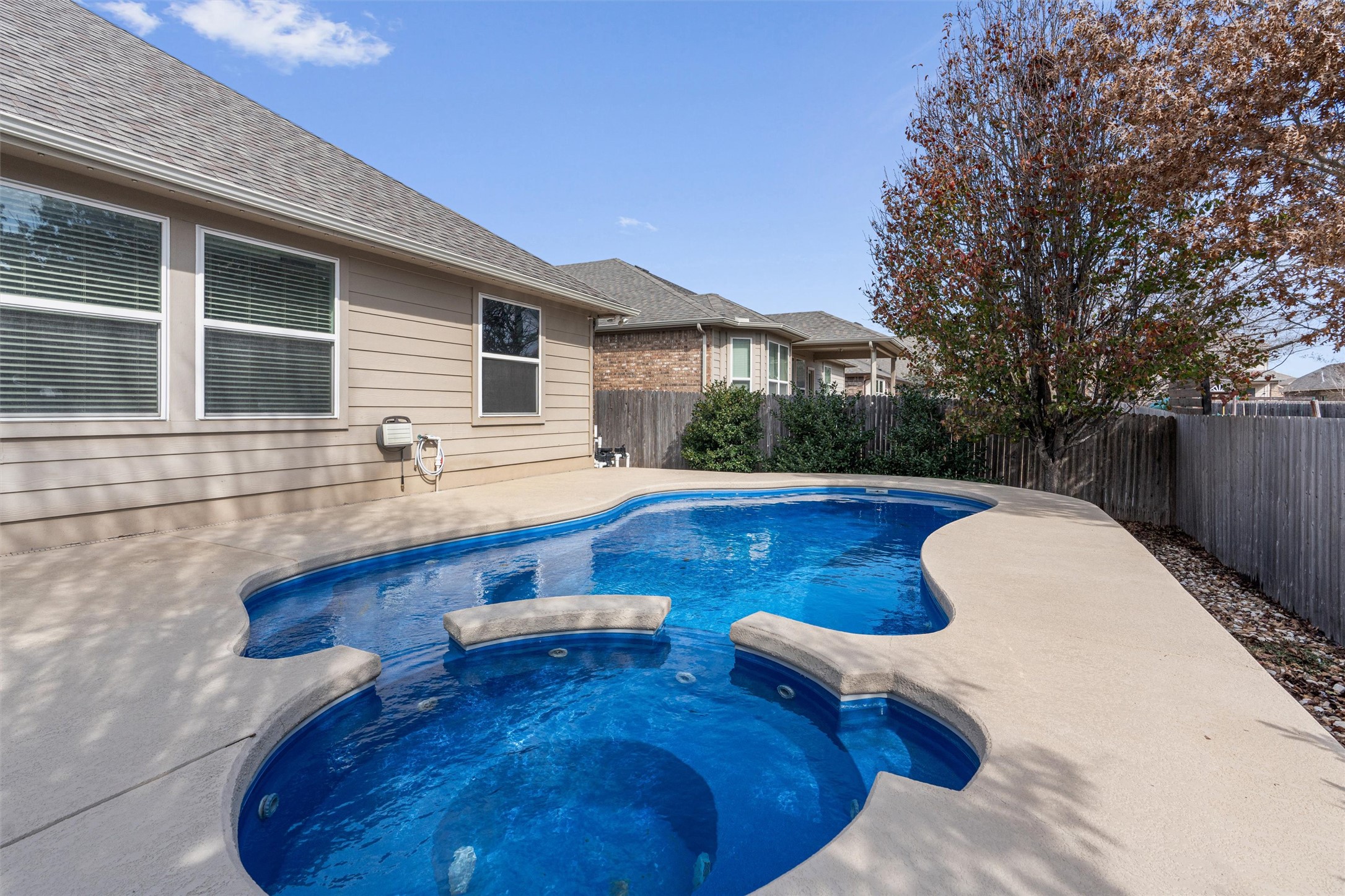 20513 Jackies Ranch Boulevard Pflugerville, TX 78660 - Photo 29 of 36 Enjoy the pool and hot tub all year round with the built in heater that fires up rapidly