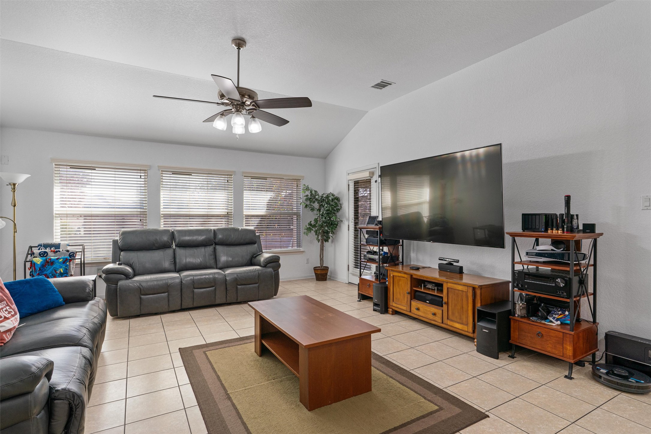 20513 Jackies Ranch Boulevard Pflugerville, TX 78660 - Photo 7 of 36 Spacious family room looking out to the backyard and pool