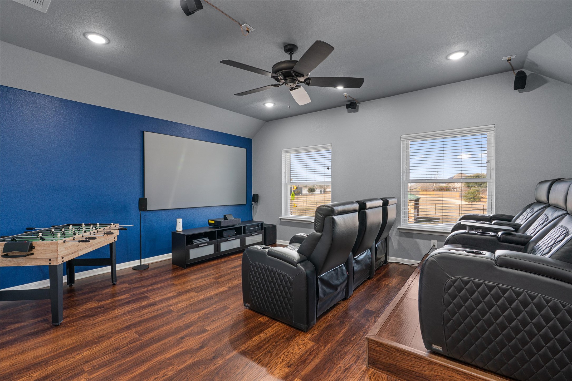 20513 Jackies Ranch Boulevard Pflugerville, TX 78660 - Photo 7 of 35 a living room with furniture and a wooden floor