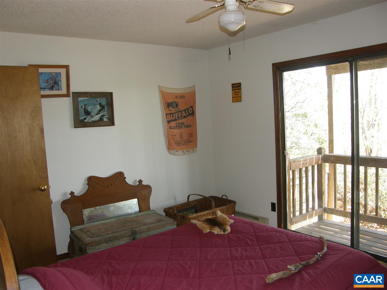 5273 Cub Creek Road Roseland, VA 22967 - Photo 15 of 31 a bedroom with a bed and a window