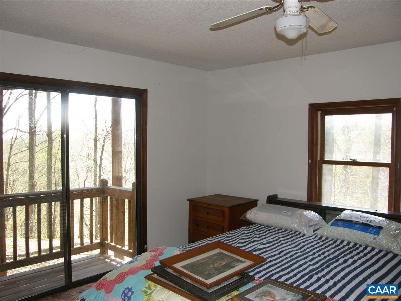 5273 Cub Creek Road Roseland, VA 22967 - Photo 16 of 31 a bedroom with a bed and a window