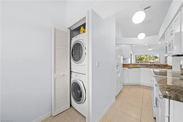a view of a storage & utility room with washer and dryer