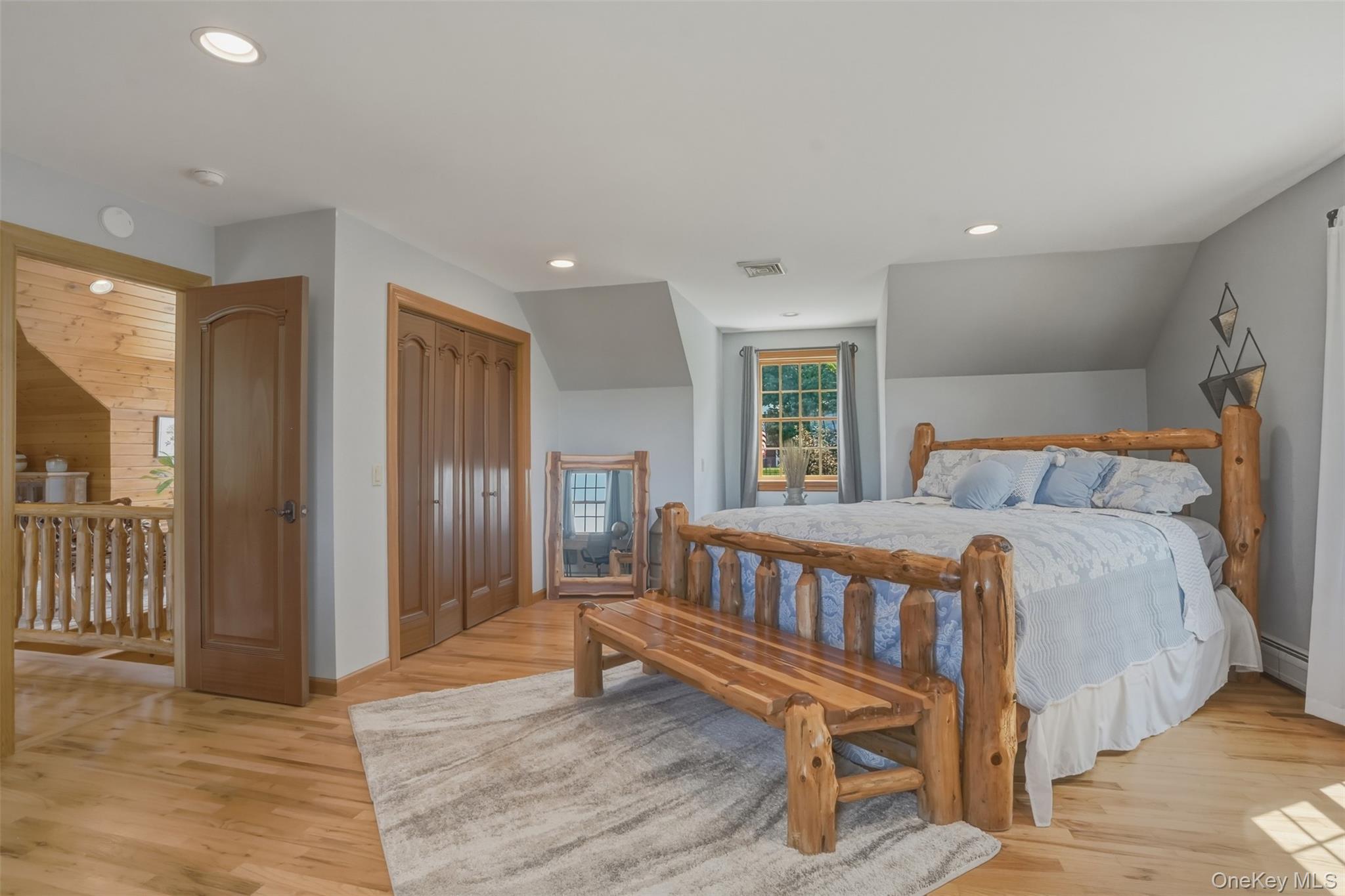 95 Judson Road Montgomery, NY 12549 - Photo 23 of 50 Upstairs, two generously sized bedrooms share a full bath, while a peaceful loft-style sitting area overlooks both the great room below and the picturesque grounds beyond.