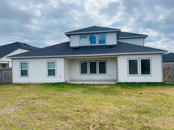 a view of a house with a swimming pool