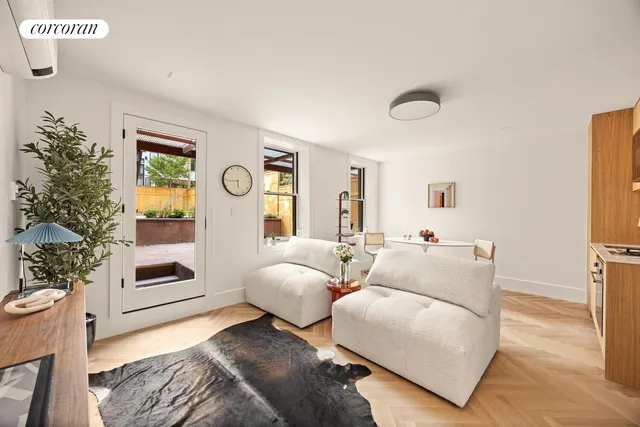 a kitchen with stainless steel appliances wooden cabinets and a stove top oven