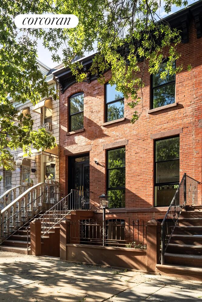 95 Monroe Street Brooklyn, NY 11216 - Photo 19 of 21 a view of a building with a fountain