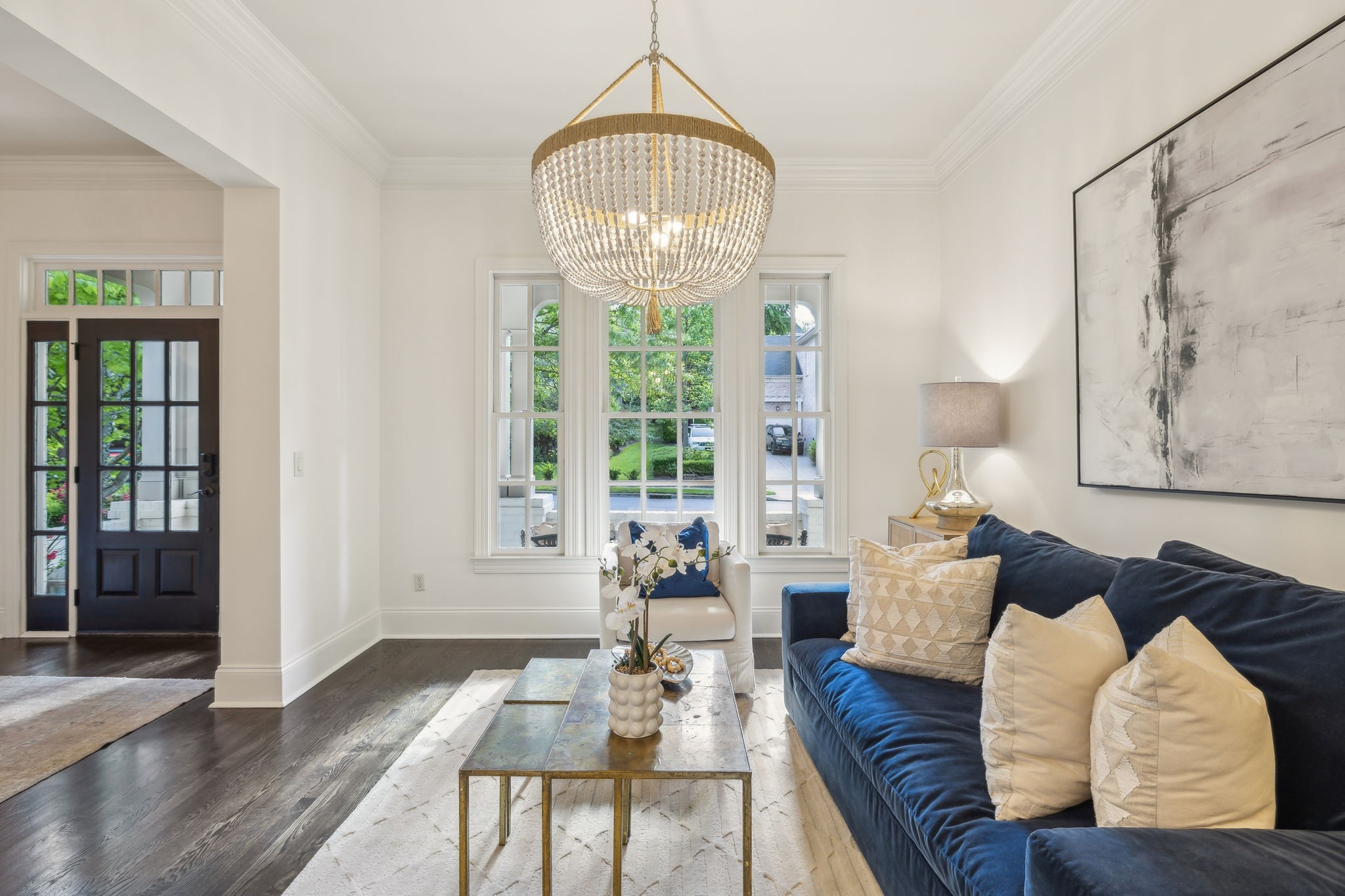 424 Wild Elm Street Franklin, TN 37064 - Photo 12 of 100 a living room with furniture chandelier and a table