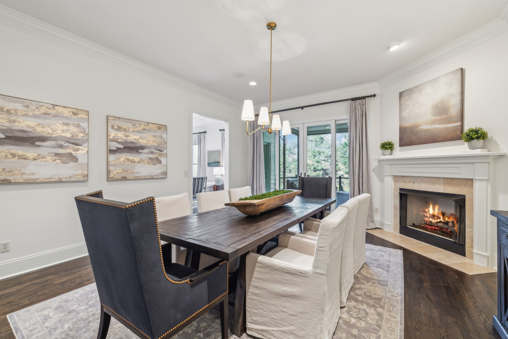 424 Wild Elm Street Franklin, TN 37064 - Photo 25 of 100 a view of a dining room with furniture window and wooden floor