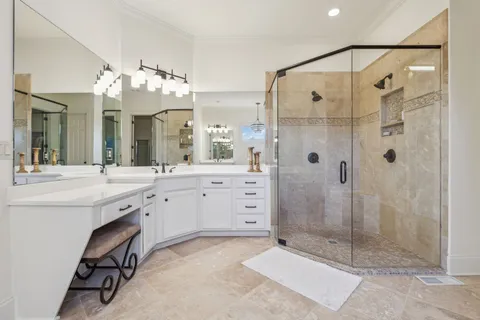 a dining room with furniture a chandelier and wooden floor