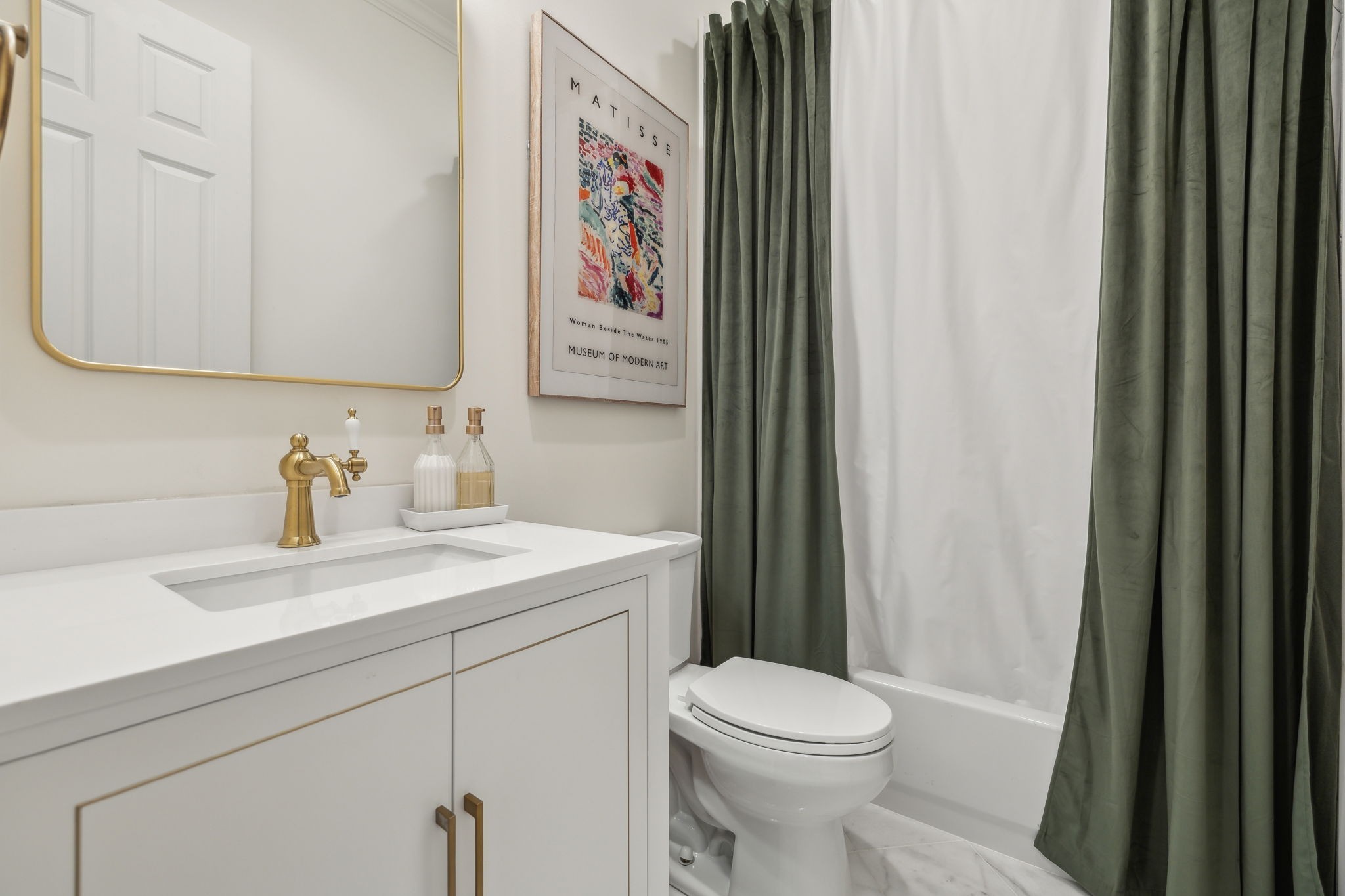 424 Wild Elm Street Franklin, TN 37064 - Photo 32 of 100 a bathroom with a sink a toilet and vanity