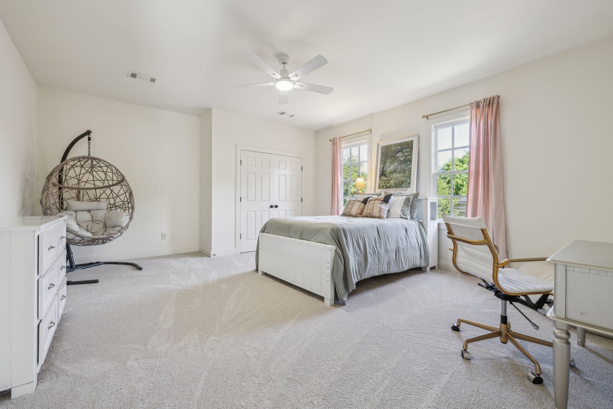 424 Wild Elm Street Franklin, TN 37064 - Photo 36 of 100 a spacious bedroom with a bed a window and a chandelier