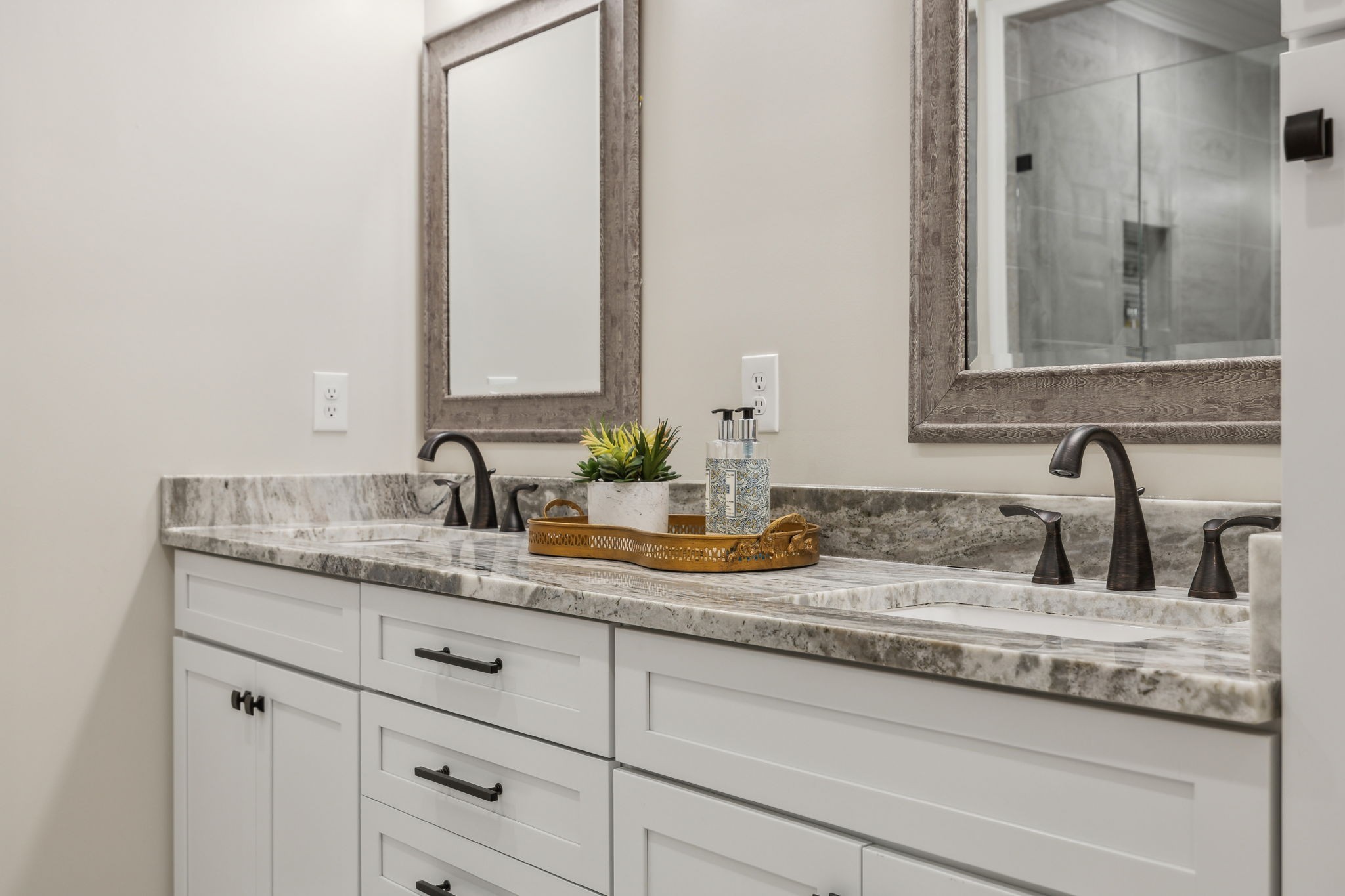 424 Wild Elm Street Franklin, TN 37064 - Photo 63 of 100 a bathroom with double sink and a mirror