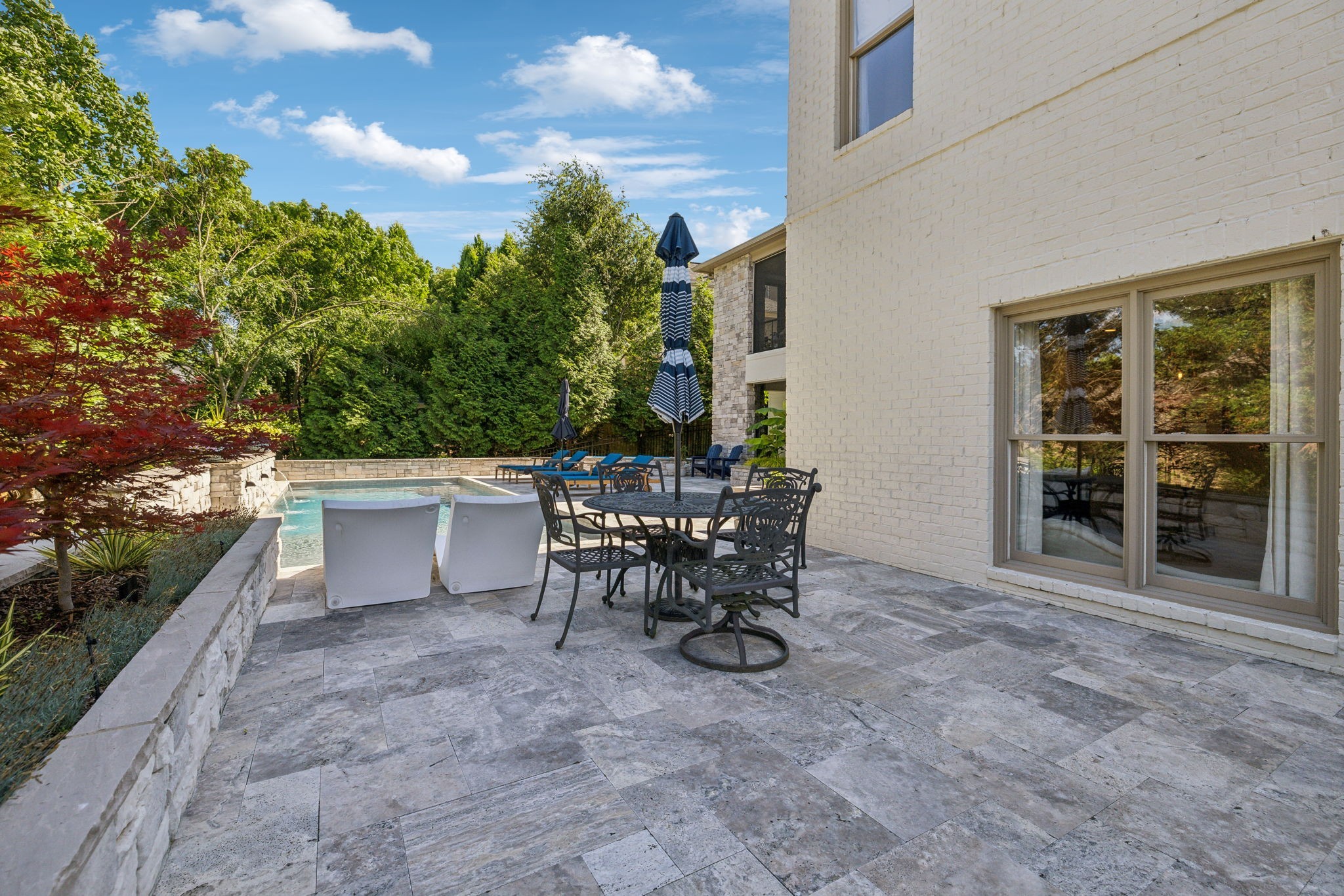 424 Wild Elm Street Franklin, TN 37064 - Photo 81 of 100 a view of a patio with a table and chairs