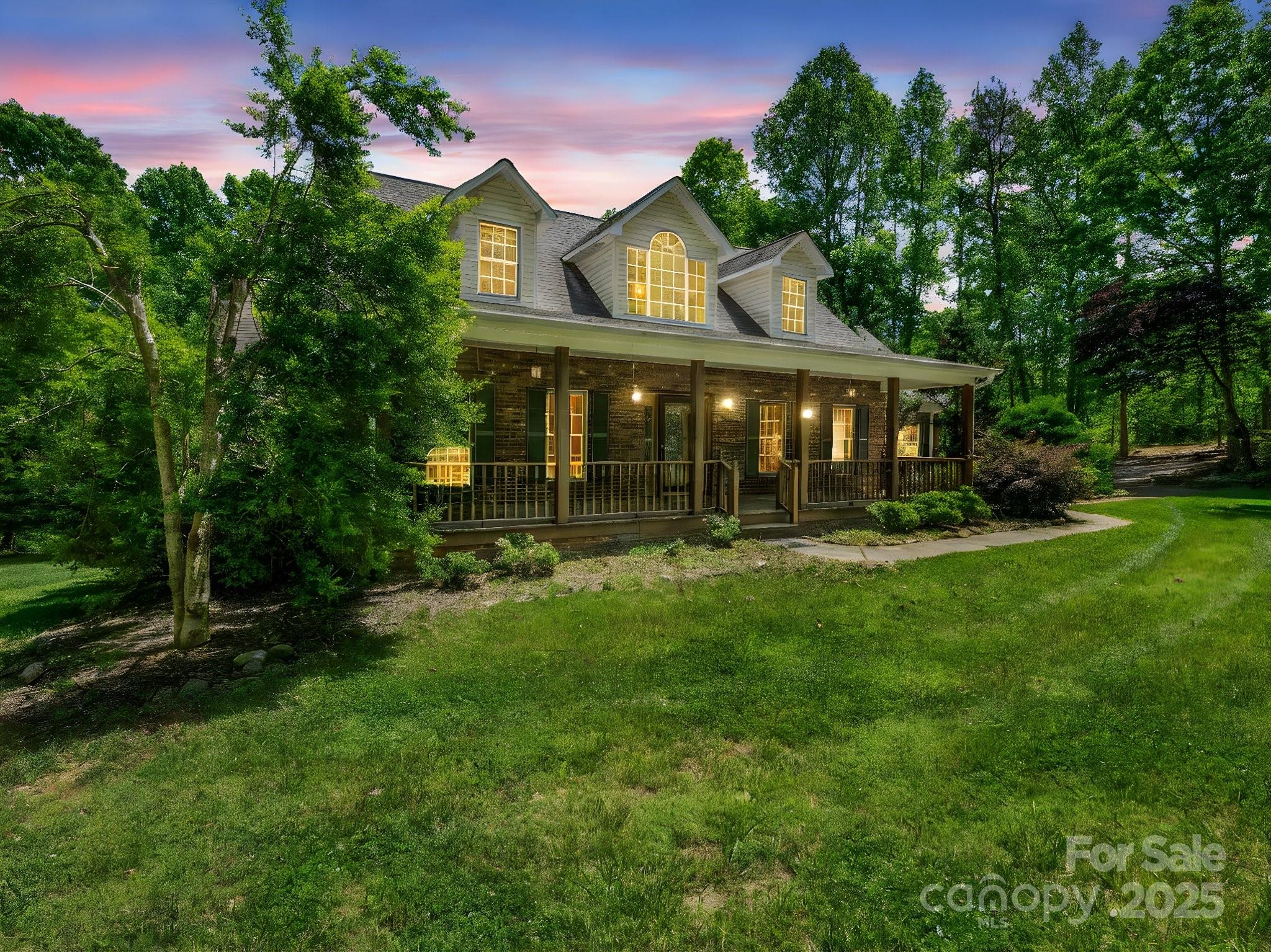163 Summit Lane Rutherfordton, NC 28139 - Photo 2 of 44 a front view of a house with a yard