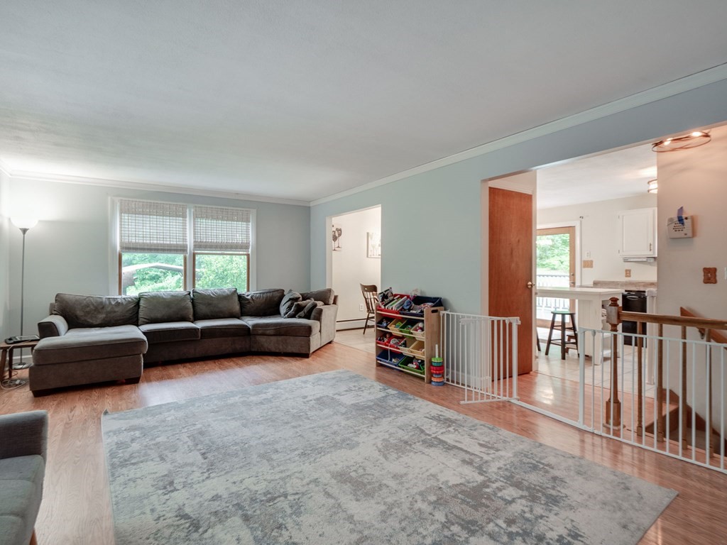 1850 North Brookfield Road Oakham, MA 01068 - Photo 19 of 42 a living room with furniture and a large window