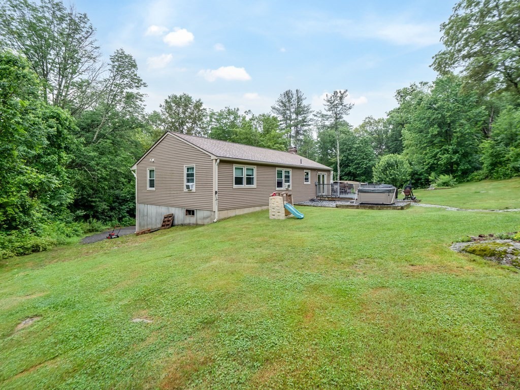 1850 North Brookfield Road Oakham, MA 01068 - Photo 9 of 42 a view of house with backyard and outdoor space